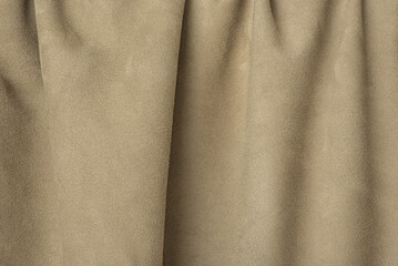 Wall Mural - beige suede wrinkled background. suede leather texture.