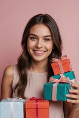 Wall Mural - a girl holding a gifts box smiling happily