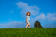 © Volodymyr - Summer, childhood, leisure and people concept. Happy little boy walking on green summer field. Kids activities on nature.