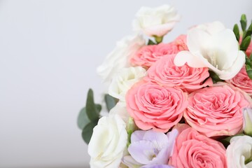 Wall Mural - Beautiful wedding bouquet on light background, closeup. Space for text