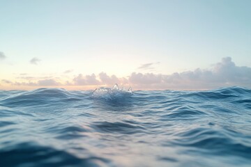 Wall Mural - A wave breaking in the ocean at sunrise with a blue sky and clouds in the background, captured with a wide-angle lens. utilizing natural light and a low depth of field. The image features beautiful 