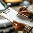 © addison - close up of a person holding a clipboard where the paper is visible with a checklist on it