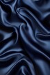 © vefimov - Blue fabric with a pattern of waves. The fabric is smooth and shiny. The waves are in different sizes and are arranged in a way that creates a sense of movement