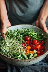 Wall Mural - Vibrant green bowl of salad with sprouts and tomatoes, freshly prepared, ready for serving