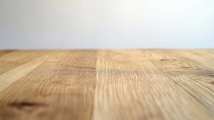 Wall Mural - light wooden tabletop texture with a blurred background ideal for showcasing products or food in a m