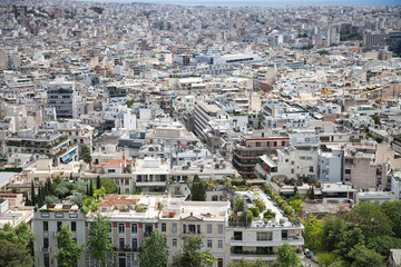 a panoramic view of athens, greece, showcasing the bustling urban landscape with a blend of modern a