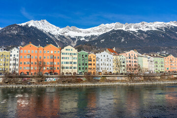 Wall Mural - Innsbruck  in Austria Tyrol with traditional buildings and Alpine peaks panoramic view