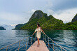 © Matteo Colombo - Young asian woman on a tourist boat, El Nido, Philippines