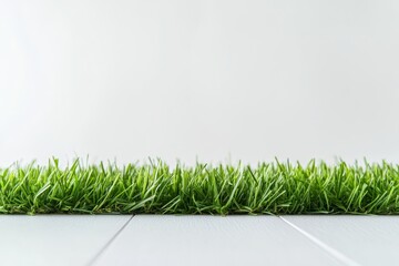 Aufkleber - A single green grassy mound stands out against a stark white background, providing a modern and clean aesthetic suitable for various design needs