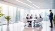 © netsay - Blurred Business People Engaged in a Collaborative Meeting in a Modern Office Building Conference Room, Fostering Innovation and Teamwork in a Dynamic Work Environment