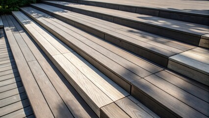 Aufkleber - An abstract view captures the layered arrangement of composite decking boards with varying lengths creating dynamic shadows. The interplay of light and dark emphasizes the