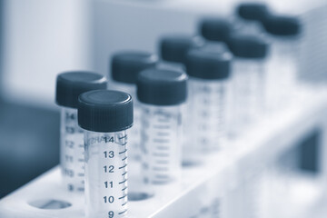 Poster - Medical or chemical background with laboratory equipment and liquids.