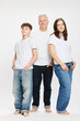 © Stefanie - Studio portrait of father with two teenage kids.