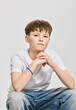 © Stefanie - Studio portrait of teenage boy.