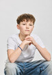 © Stefanie - Studio portrait of teenage boy.