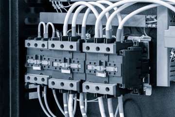 Poster - Electrical panel with many wires, electrical parts, automatic switches, breakers, residual current devices, fuses, terminals