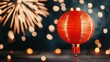 © Arfa_Media - Red lantern illuminating the night sky during a festive celebration with fireworks