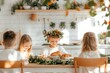 © Sanchai - A family enjoying breakfast in a bright kitchen, with kids sitting at a wooden dining table and sunlight streaming in