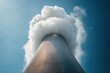 © zakiroff - Cooling tower with billowing white steam against clear sky highlighting industry impact on air environment protection concept