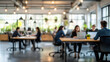 © mozZz - Blurred people silhouettes working together in a luminous workplace, startup modern office room with greenery and warm light