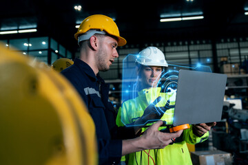 professional engineer or programmer check robotic arm with ai tool in factory lab, specialist job an