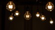 © stockist7 - A light bulb glowing dimly, surrounded by brighter but distorted images of itself.