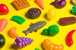 © ADDICTIVE STOCK - Plastic food items symbolizing diet culture and junk food critique