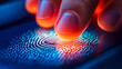 © lena - A hand gently presses a glowing fingerprint scanner in a dimly lit space, highlighting innovation