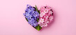 © Jack - Hyacinth flowers in hole in heart shaped form over pink punchy pastel background. Top view, flat lay. Banner. Spring, summer or garden concept. Present for Woman day