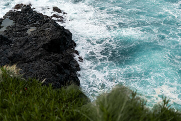 waves crashing on rocks