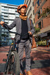 © Anthony Mujica Viera - Vertical image of an urban cyclist in the city.