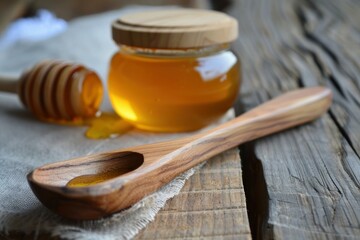 Poster - Golden honey dripping from wooden dipper and spoon with honey jar on rustic wooden table, creating a sweet and natural scene