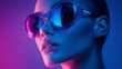 © Andrii Savchuk - Futuristic portrait of a woman in blue neon lighting