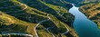 © Fidel - A stunning aerial view of the winding roads and terraced vineyards of the Douro Valley in Portugal, with the river meandering through the lush landscape, Douro Valley scene