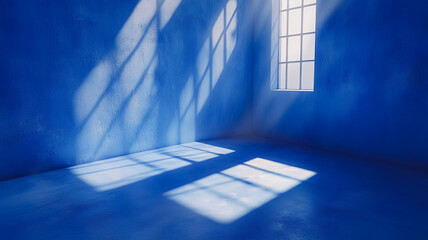 Poster - Azure Serenity: Sunbeams dance across a vibrant blue room, illuminating the space with ethereal light and casting dramatic shadows. The tranquil scene evokes a sense of calm and introspection. 