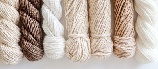 Aufkleber - Neutral macrame cord in various shades arranged on a white background ideal for crafting projects and DIY home decor inspiration