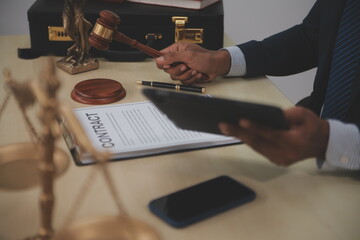 Law theme, gavel or mallet of the judge, lawyer enforcement officers, evidence-based cases taken into account in the court abount business, legislation.