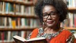 © Kenny - Mature african female in library holding book with thoughtful expression