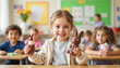 © Iryna - Happy girl holding chocolate bunnies in classroom setting