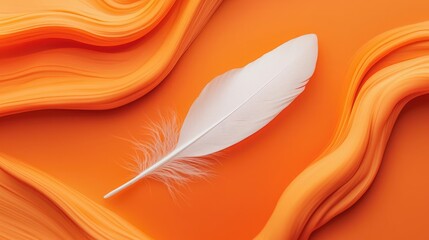 Poster - Feather abstract background concept. A delicate white feather rests on vibrant orange fabric, showcasing texture and color.