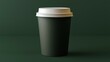 © Gibster - Sustainability, Eco friendly products and packaging. A simple green coffee cup with a white lid against a dark background.