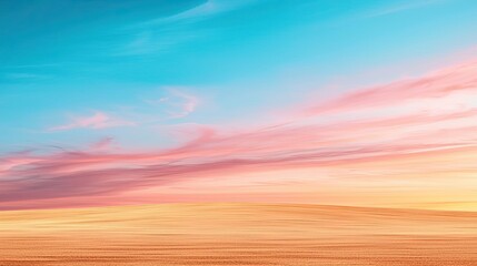 Poster - Minimal skies idea. A serene landscape featuring a vibrant dawn sky with soft clouds and golden hues.