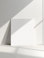 Leinwandbilder - Minimalist space featuring a pristine white sheet of paper illuminated by natural light at midday. Generative AI