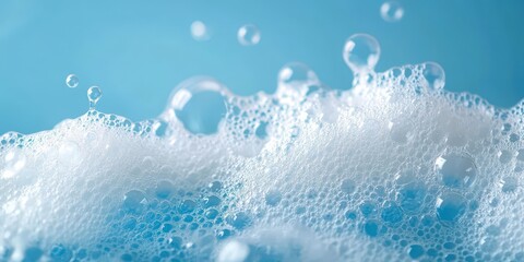 Poster - Clean Foam and Bubbles on a Blue Surface with Refreshing Splashes and Soft Textures for Hygiene and Cleanliness Themes
