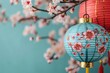 © Arfa_Media - Glowing lanterns and cherry blossoms creating festive charm for chinese new year