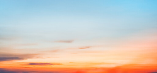 Wall Mural - sky dusk background,sunset dramatic pink, orange, red,yellow sky, cloud with golden sunlight over se