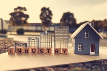 Poster - A miniature cityscape representing industry growth.