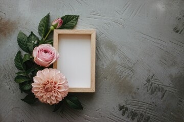 Poster - Pink flowers and a wooden frame on a grey background