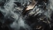 © Mohammed - Abstract close-up of smoke billowing from smoldering remnants, creating a dramatic, dark, and moody scene.