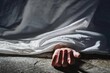 © Poetra RH - Hand of dead body covered by white sheet,horror and crime scene.